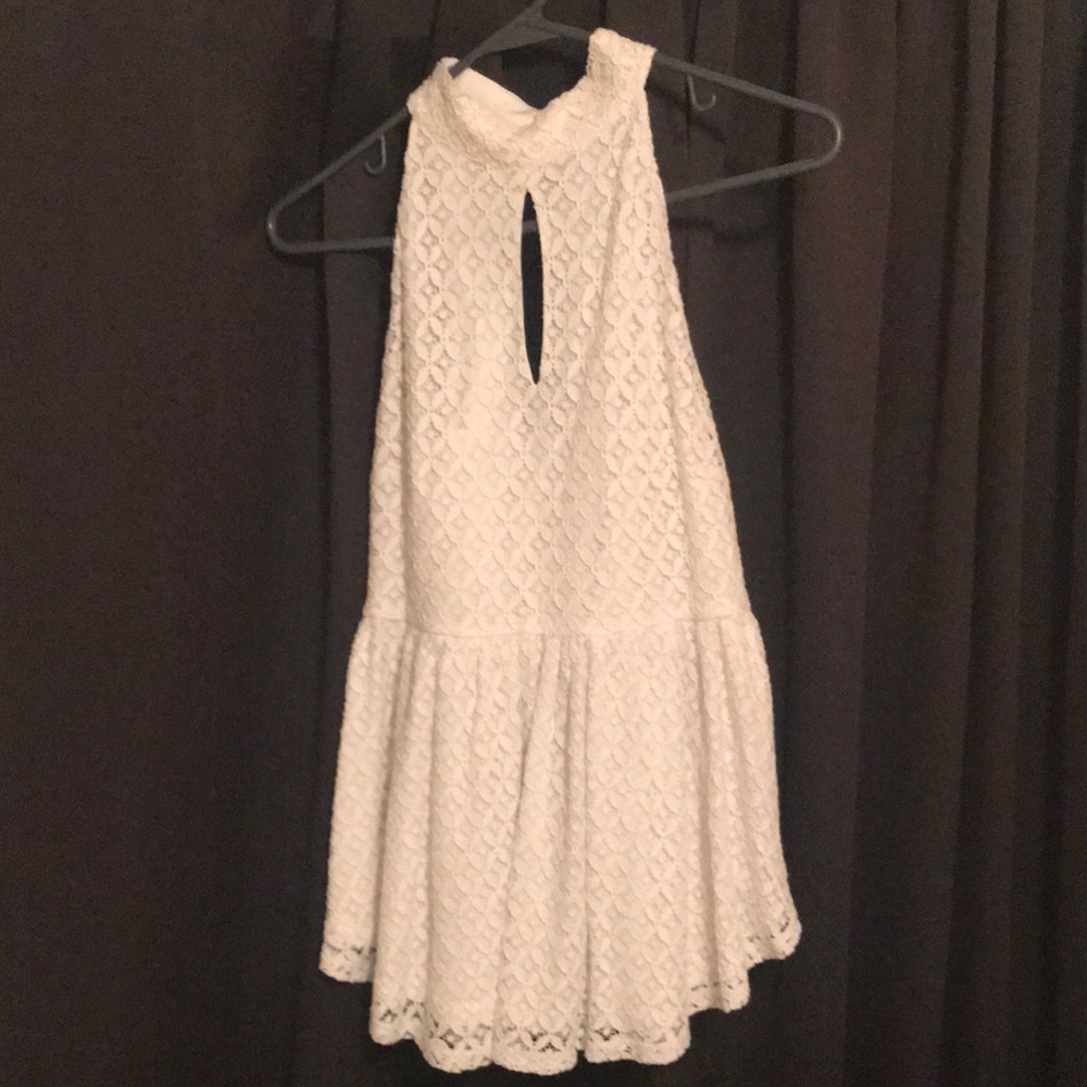 hey girls im selling this white stylish tank top